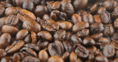 Coffee beans are roasted in a frying pan Stock Footage 106943119