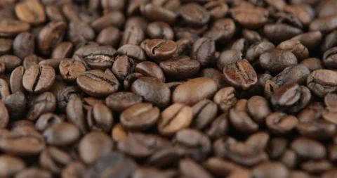 Coffee beans are roasted in a frying pan Stock Footage 106943411