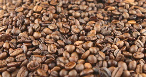 Coffee beans are roasted in a frying pan Stock Footage 106945115