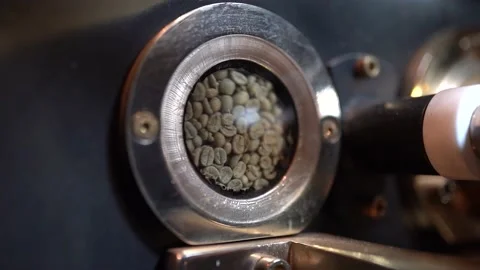 Coffee beans are roasted in the roasting machine Stock Footage 181050134