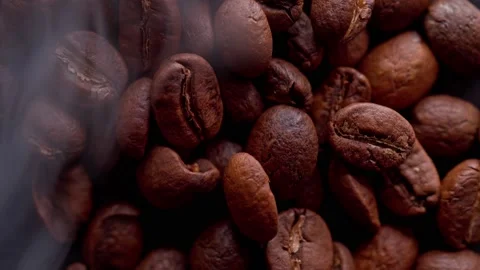 Coffee beans are roasting, smoke comes from coffee beans Stock-Footage 132039231