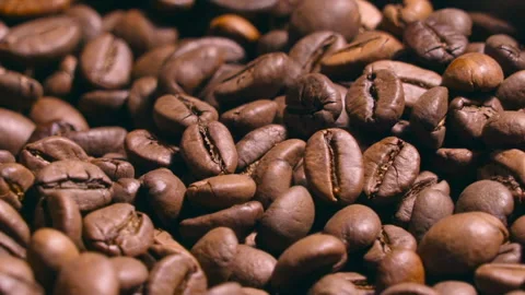 Coffee beans are roasting, view in the round hole. Video Stock Footage 220348761