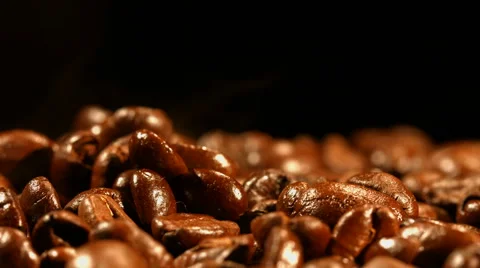 Coffee beans are steaming close up Stock Footage 57682101