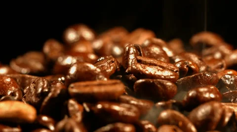 Coffee beans are steaming close up Stock Footage 57682490
