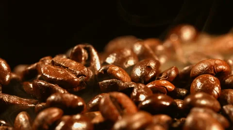 Coffee beans are steaming close up Stock Footage 57682794
