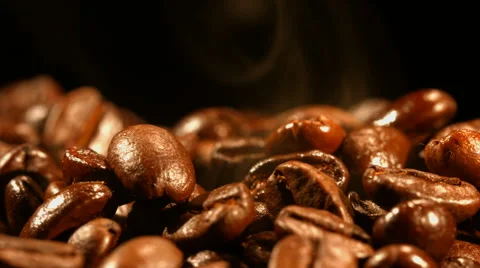 Coffee beans are steaming close up Stock Footage 57683490