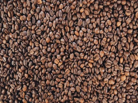 Coffee beans are on the table. Rotate. Slow motion Stock Footage 73670302