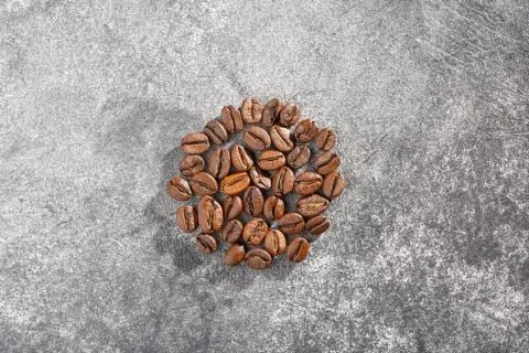 Coffee beans. Aromatic coffee beans. Coffee beans on a gray background. 写真素材