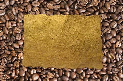 Coffee beans background and old paper Stockfoto's