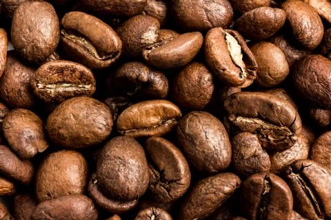Coffee beans background. Close-up of roasted grains Stock Photos