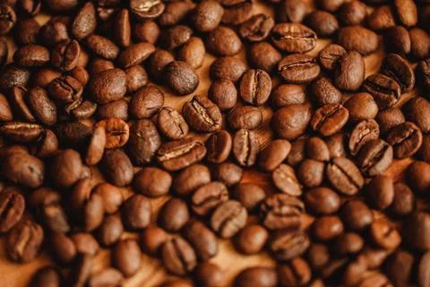 Coffee beans background. Closeup view. Background for website design or brochure Stock Photos