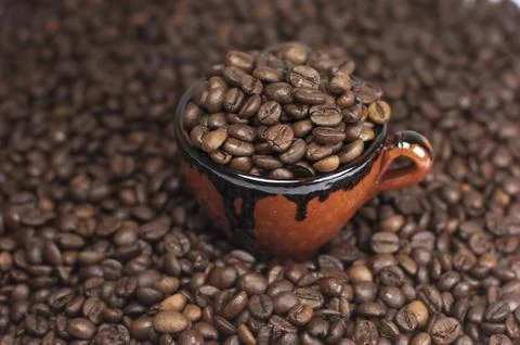 Coffee beans, background, cup Stock Photos