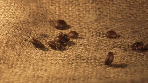 Coffee beans on the background of light burlap Stock Footage 102420737