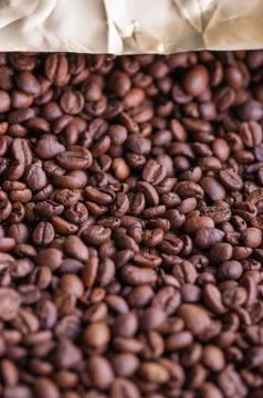 Coffee beans background. Light roasted natural coffee beans. Morning and vigo Foto stock