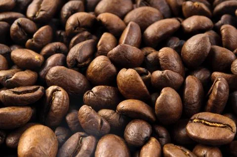 Coffee beans background macro Stock Photos
