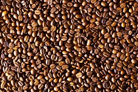 Coffee beans. Background of roasted fresh brown coffee beans. Perfect Stock Photos