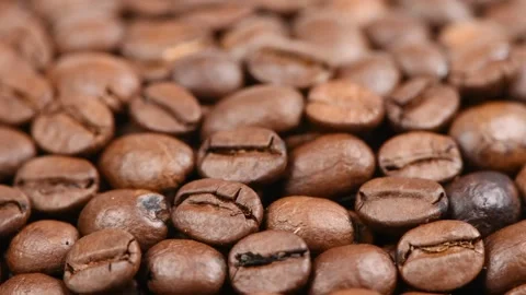 Coffee beans background. Side view. Loop motion. Rotation 360 Stock Footage 245079723