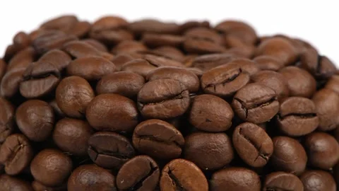 Coffee beans background. Side view. Loop motion. Rotation 360. Stock Footage 245080692