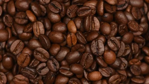 Coffee beans background. Side view. Loop motion. Rotation 360. Stock Footage 245083177