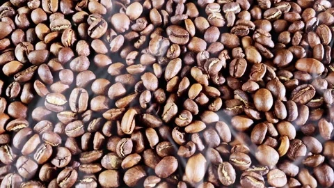 Coffee beans background with smoke Stock Footage 252833885