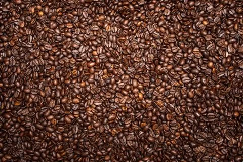 Coffee beans background view from above. Stock Photos