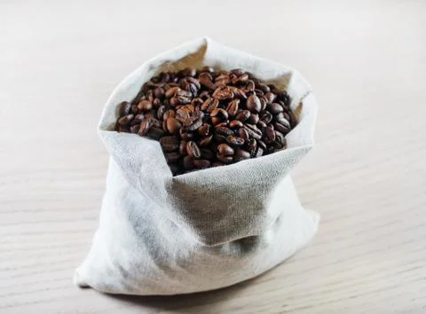 Coffee beans in bag Stock Photos