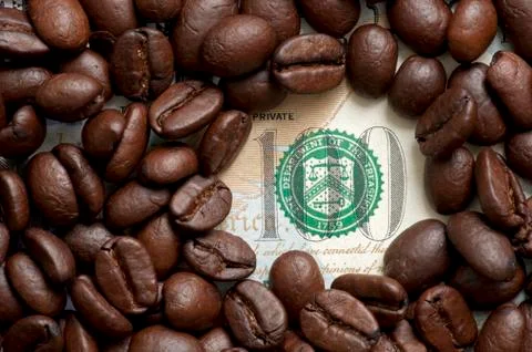 Coffee beans on bank note Stock Photos