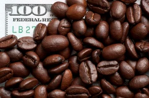 Coffee beans on bank note Stock Photos