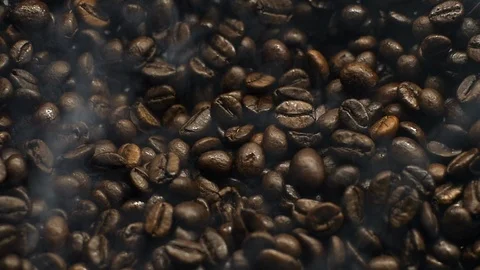 Coffee beans beeing roasted with smoke Stock Footage 96879989