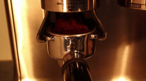 Coffee beans being freshly ground into a coffee filter Stock Footage 36551140