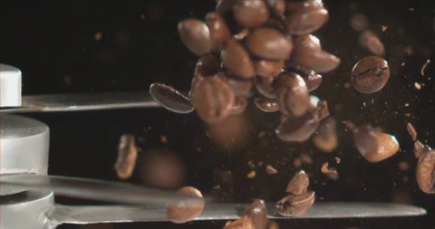 Coffee Beans being grinded in Slow motion Stock Footage 97775957