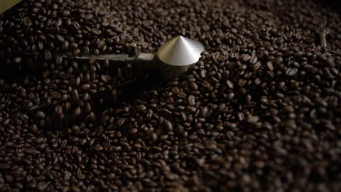 Coffee beans being roasted in slow motion Stock Footage 94375926