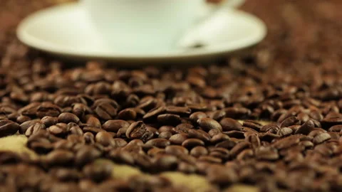 Coffee Beans BG and Cup with Steam Vidéo 106484826
