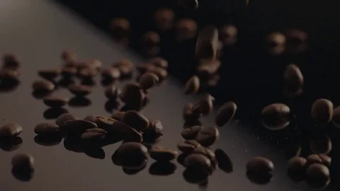 Coffee beans on black background. Stock Footage 76988469