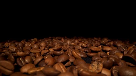 Coffee beans on a black background.  Stock Footage 119438722