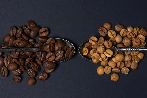 Coffee beans on a black background. Stock Photos