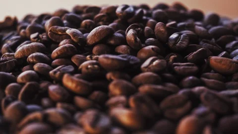 Coffee Beans On The Brown Background 4k Stock Footage 121571386