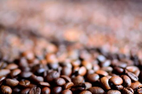 Coffee beans on burlap background	 Stock Photos