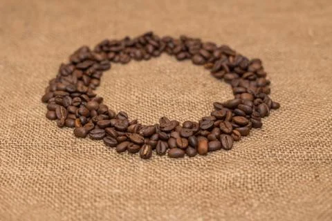 Coffee beans burlap fabric Stock Photos