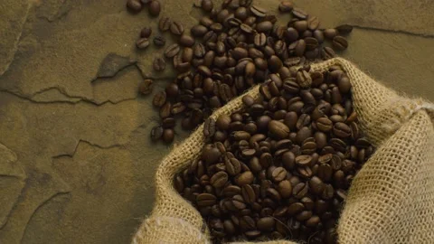 Coffee beans in a burlap jute sack Video stock 137028524