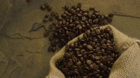Coffee beans in a burlap jute sack Video stock 137028783