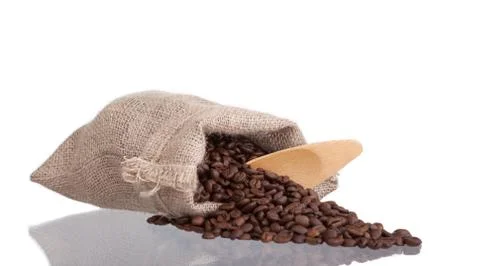 Coffee beans in burlap sack Stock Photos