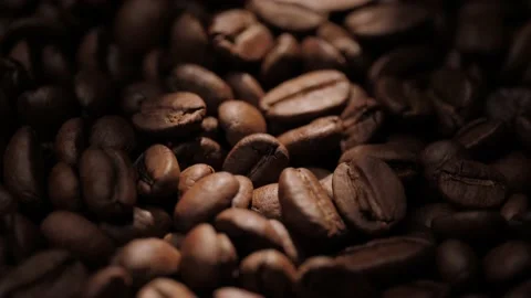 Coffee beans. Camera moves slowly and showing roasted coffee beans in shadow Stock-Footage 171896007