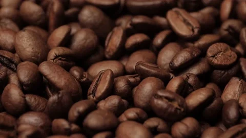 Coffee beans. Camera slowly moves down to show close-up of roasted coffee beans Stock-Footage 168661033