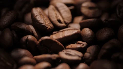 Coffee beans. Camera slowly moves down and showing awesome roasted coffee beans Video stock 171896026