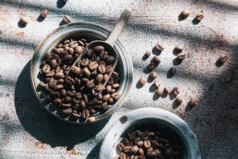 Coffee beans in a ceramic plate. Stock Photos