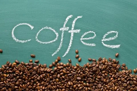 Coffee beans on chalkboard Stock Photos