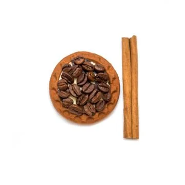 Coffee beans cinnamon cookie white cup and saucer Stock Photos