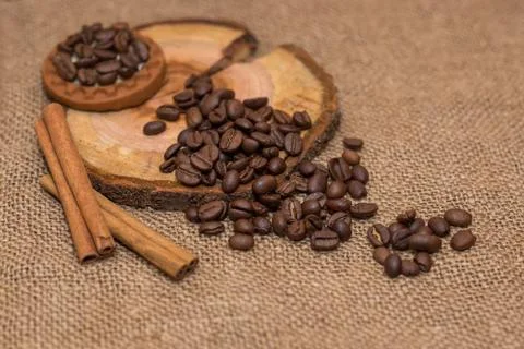 Coffee beans cinnamon cookie white cup and saucer Stock Photos