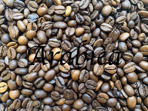 Coffee beans close-up in the background Stock Photos
